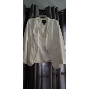 Cream colored blazer, size medium.